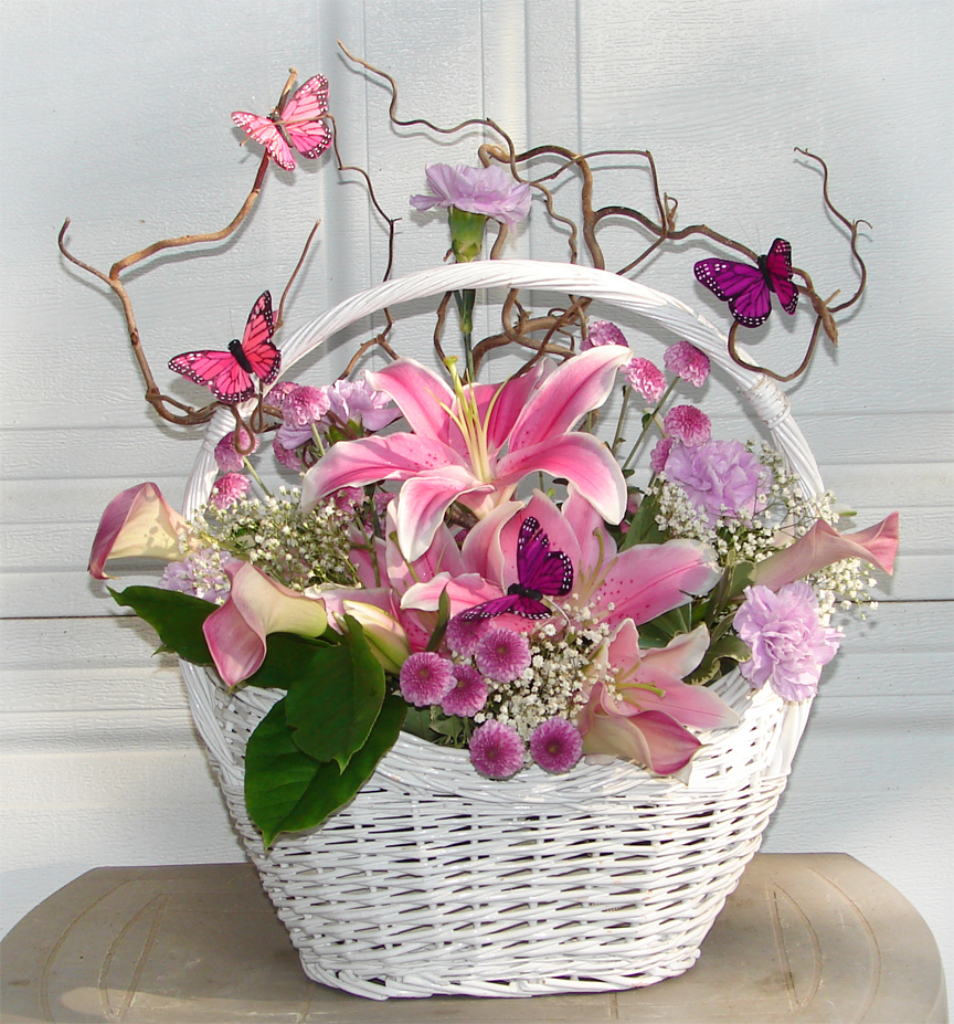 Pink Lilies and Calla Lilies in a white basket